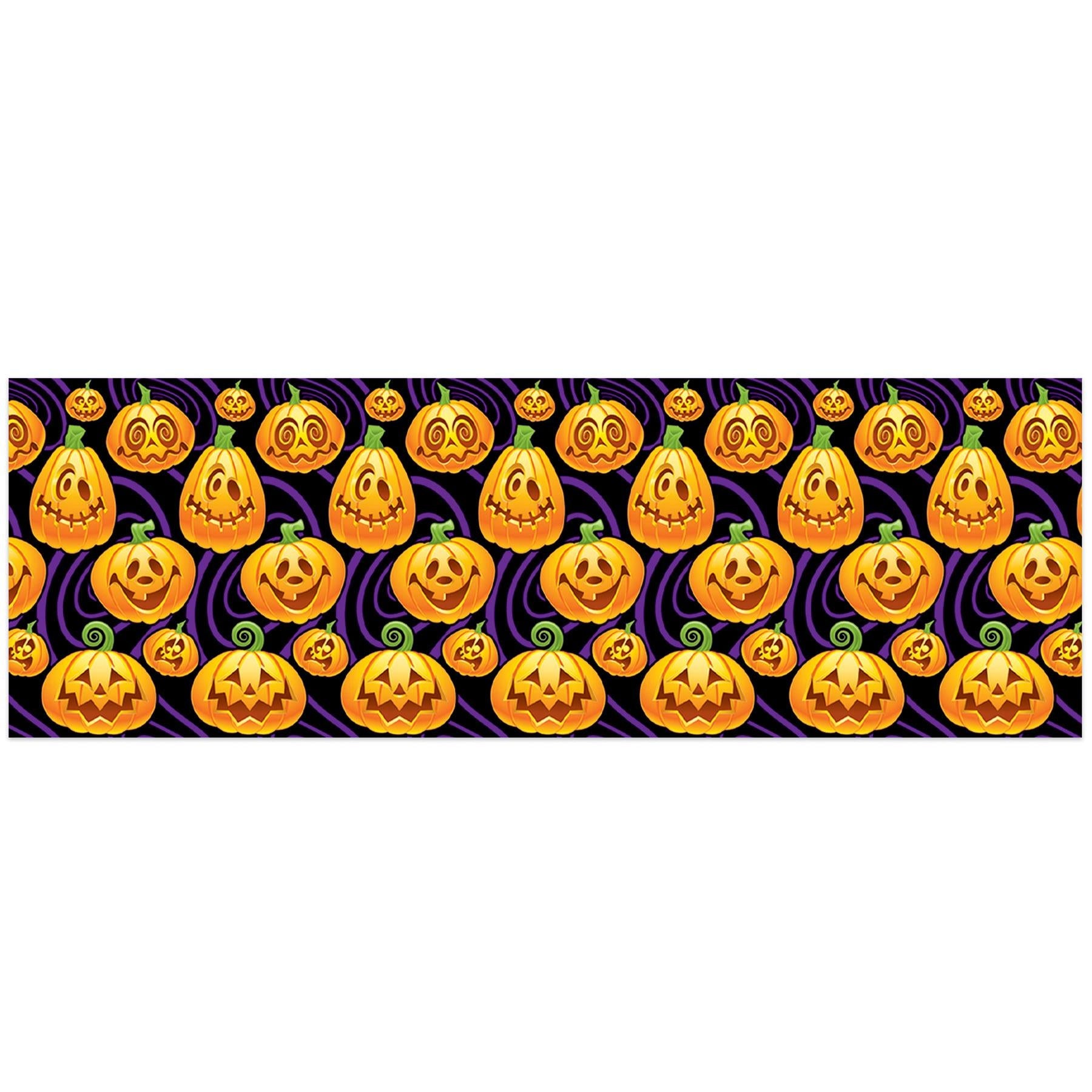 Jack-o-lantern printed backdrop four feet tall and thirty feet long, sized to cover a long gymnasium wall for a Halloween carnival