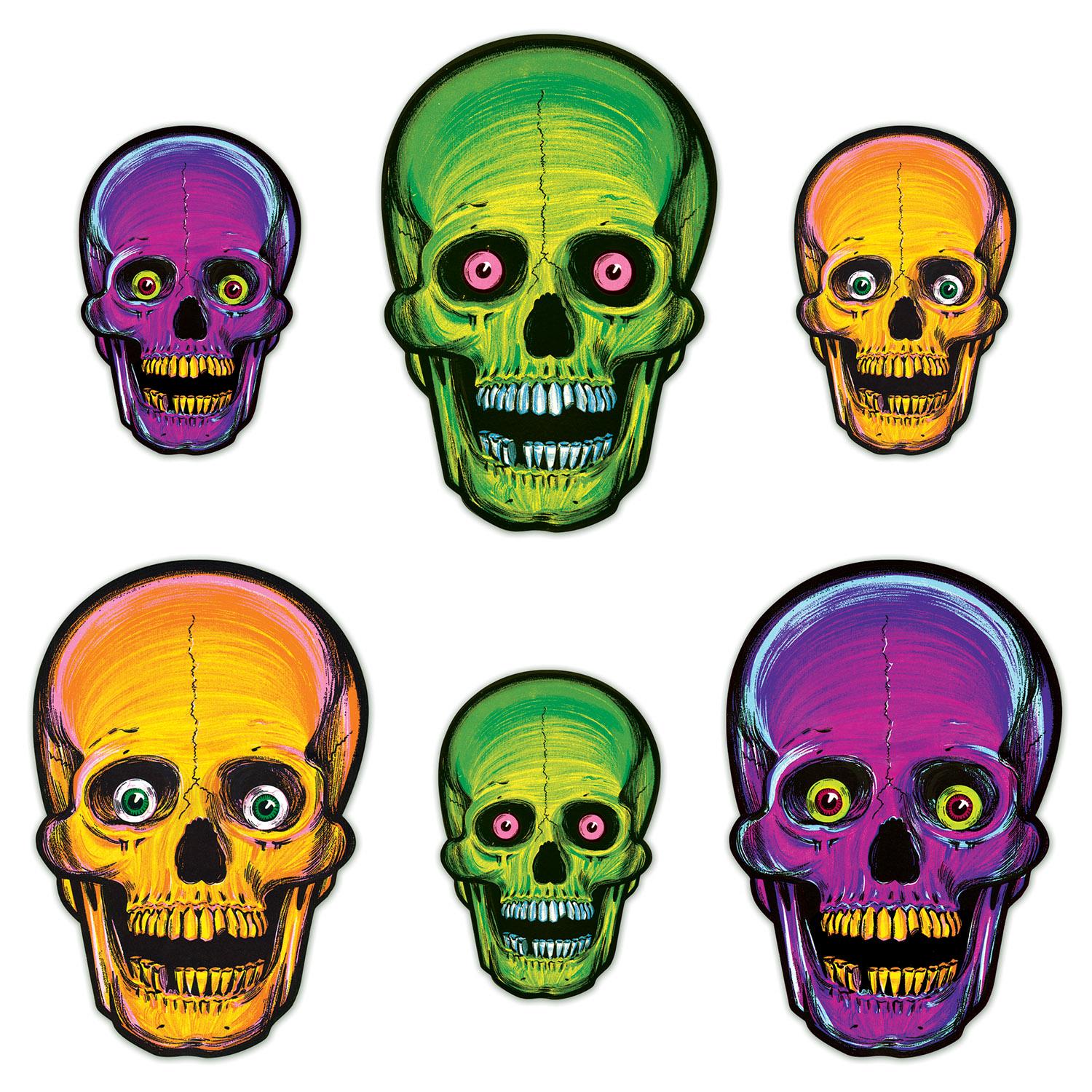 Vintage Halloween Nite-Glo skull cutouts in green and pink, the mid-century palette that bridges vintage and modern Halloween decor
