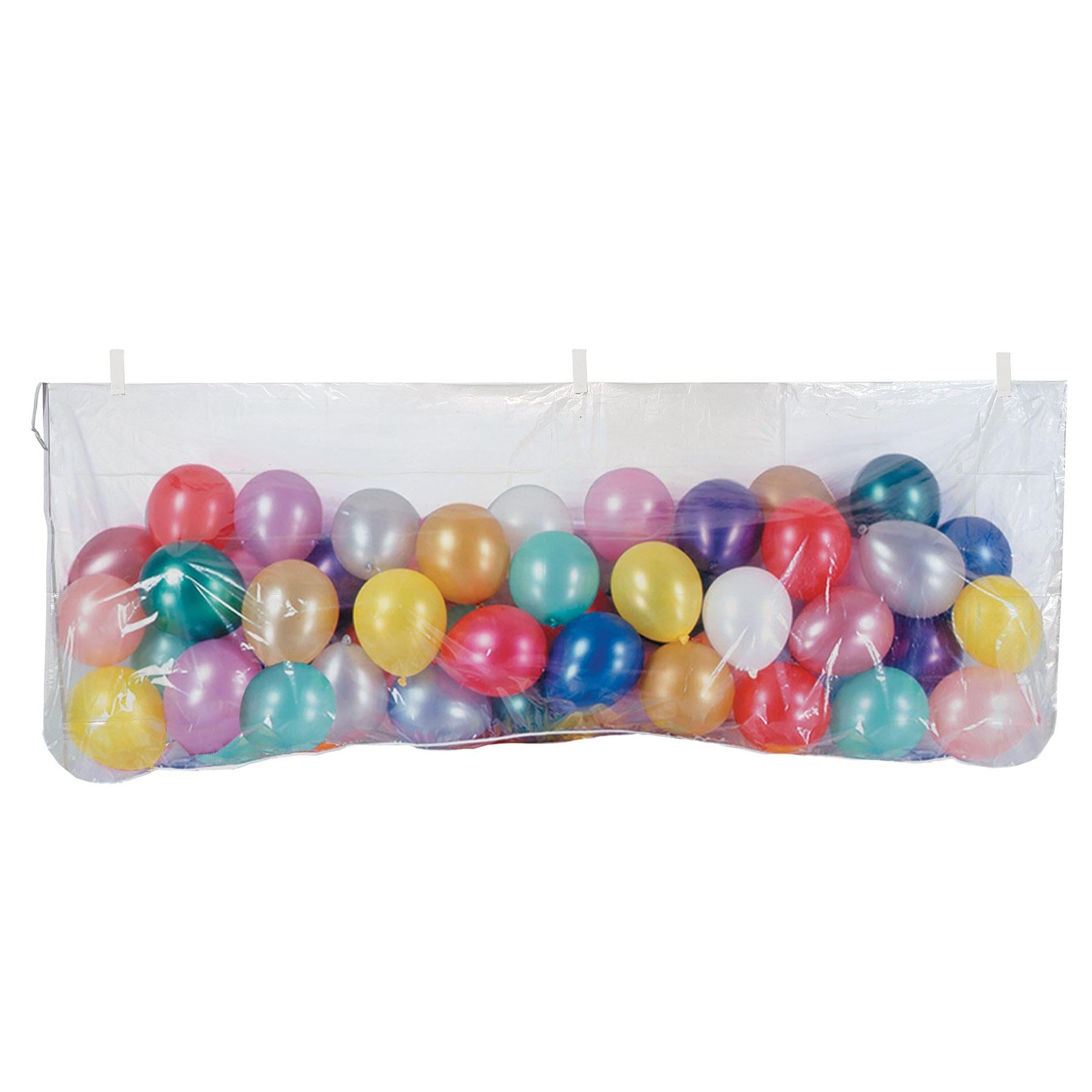 Plastic balloon drop bag with one hundred multicolor balloons for a New Year's Eve countdown